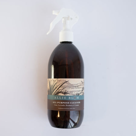 A bottle of Allie Blom All-Purpose Cleaner. The label shows an illustrated karoo landscape with ingredients including lime, lavender, rosemary and lemon.